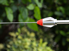 Close-up of alternate red Pocket Hose nozzle attachment